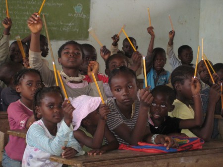 Children holding Pencils